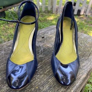 Dark blue high heels.